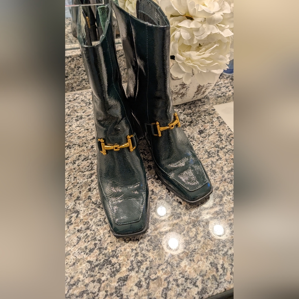 Sleek Black and Gold Boots for a Bold Statement